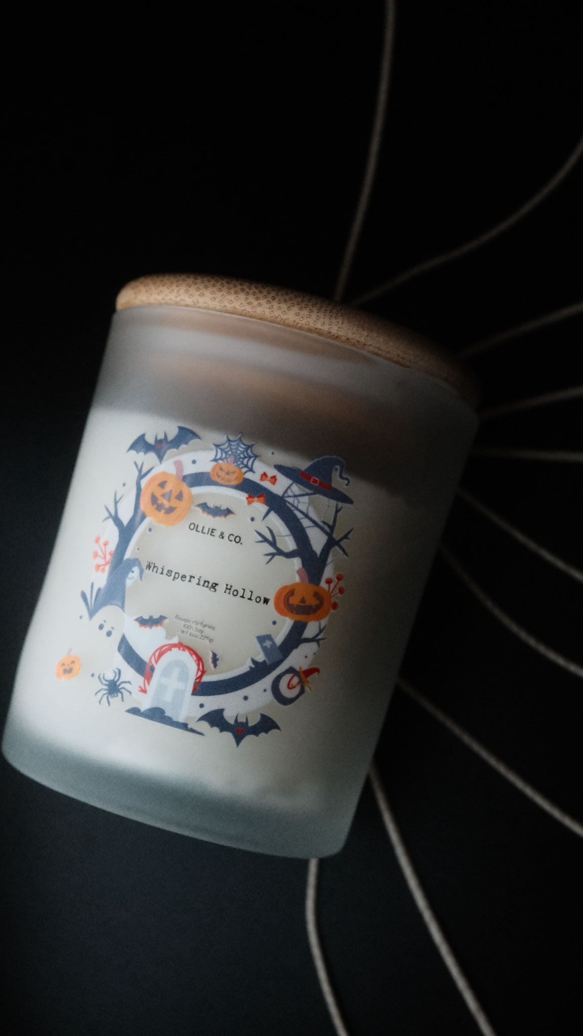 Whispering Hollow by Ollie & Co. with white sage, amber, vetiver, sandalwood, tobacco leaf.
