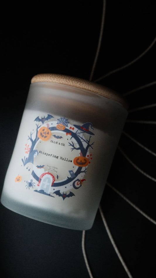 Whispering Hollow by Ollie & Co. with white sage, amber, vetiver, sandalwood, tobacco leaf.