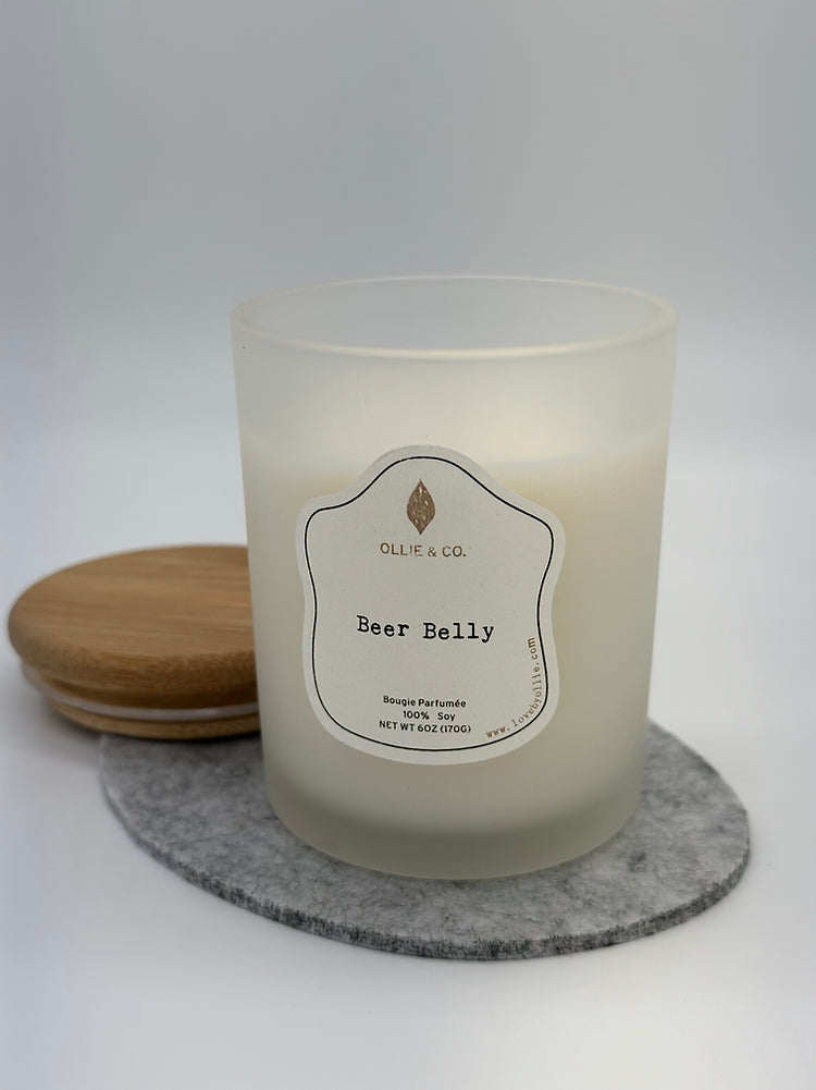 Beer Belly by Ollie & Co. with subtle yeast, beer-inspired, chocolatey warmth when lit.