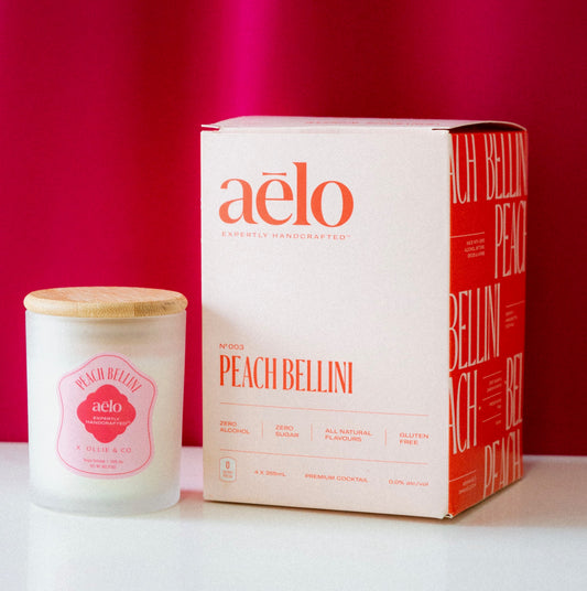 Peach Bellini by aēlo x Ollie & Co. by Ollie & Co. with peach bellini, sweet peach, sparkling cocktail mood.