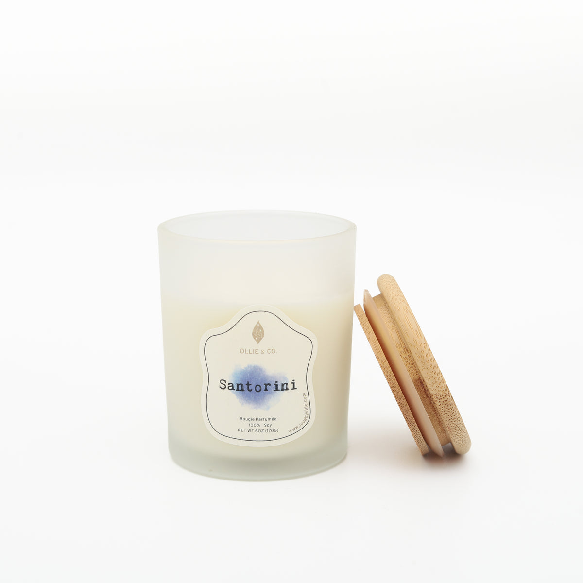 Santorini by Ollie & Co. with waterfall, sea.