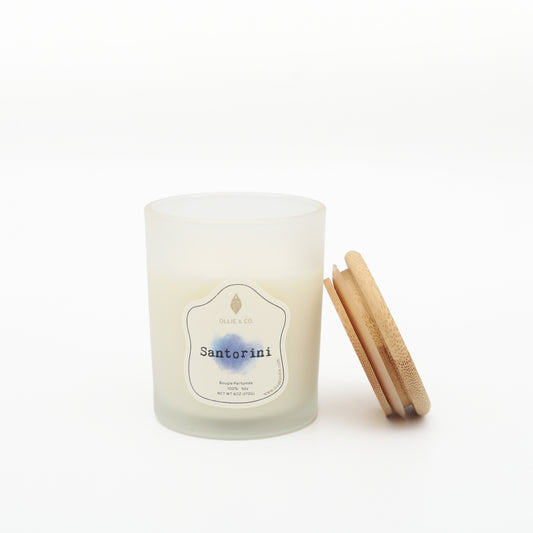 Santorini by Ollie & Co. with waterfall, sea.