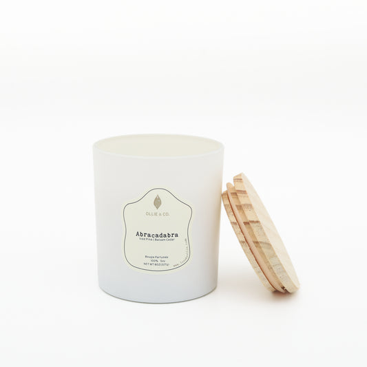 Abracadabra by Ollie & Co. with iced pine, balsam cedar.