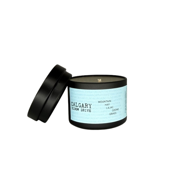 Calgary Elbow Drive 2oz single soy candle by Ollie & Co. with mountain, hay, ozone, lilac and fresh grass.